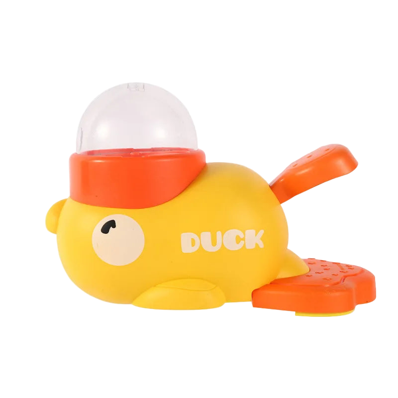 Yellow duck toy with an orange beak and feet on a white background