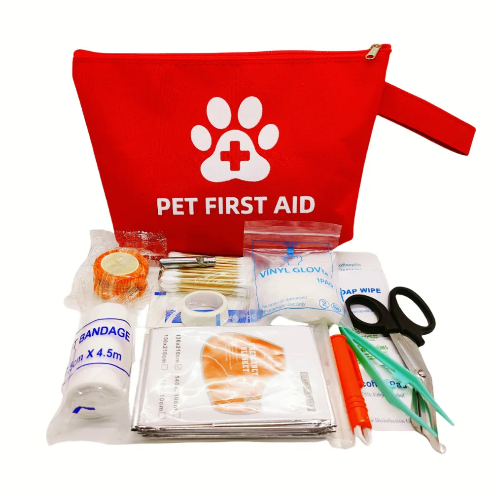 Pet first aid kit with red pouch featuring a paw print and 'Pet First Aid' text, displayed on a white background.