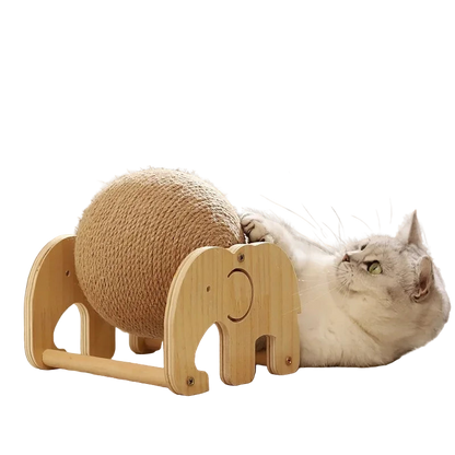 Cat playing with a wooden toy shaped like an elephant and a ball on a light-colored floor.