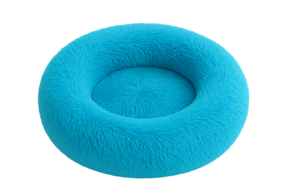 Turquoise donut-shaped pet bed on a white background