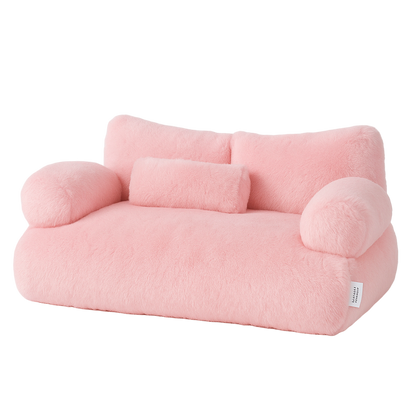 Pink inflatable sofa on a white background
