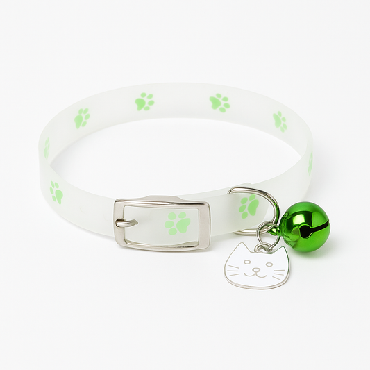White pet collar with green paw prints, a silver buckle, and a green bell on a white background