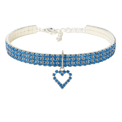 Blue beaded choker necklace with a heart-shaped pendant on a white background