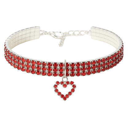 Red crystal choker necklace with a heart pendant on a white background