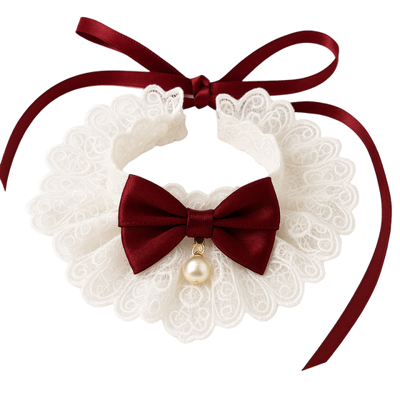 Lace collar with a red bow and pearl accent on a white background