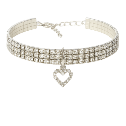 Silver choker necklace with heart charm on a white background