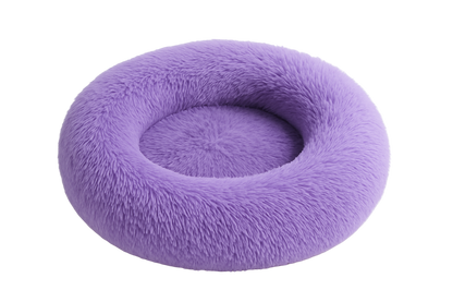 Purple donut-shaped pet bed on a white background